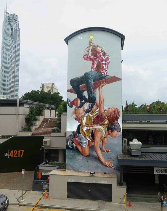 A vibrant and evocative street art scene at the Gold Coast, showcasing colorful murals and creative expressions.