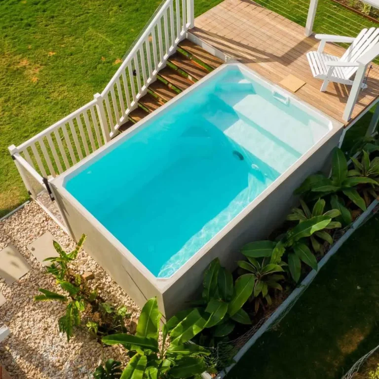 Above ground plunge pool with timber deck and white railing in Burleigh Gold Coast