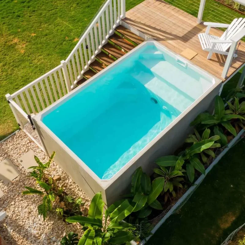 Above ground plunge pool with timber deck and white railing in Coolangatta Gold Coast