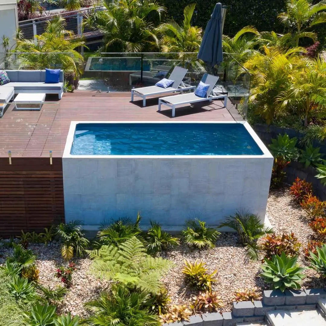 Above ground plunge pool with timber deck and landscaped garden in Varsity Lakes Gold Coast