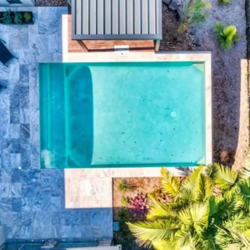 Rectangular plunge pool with clean modern design viewed from above in Miami Gold Coast